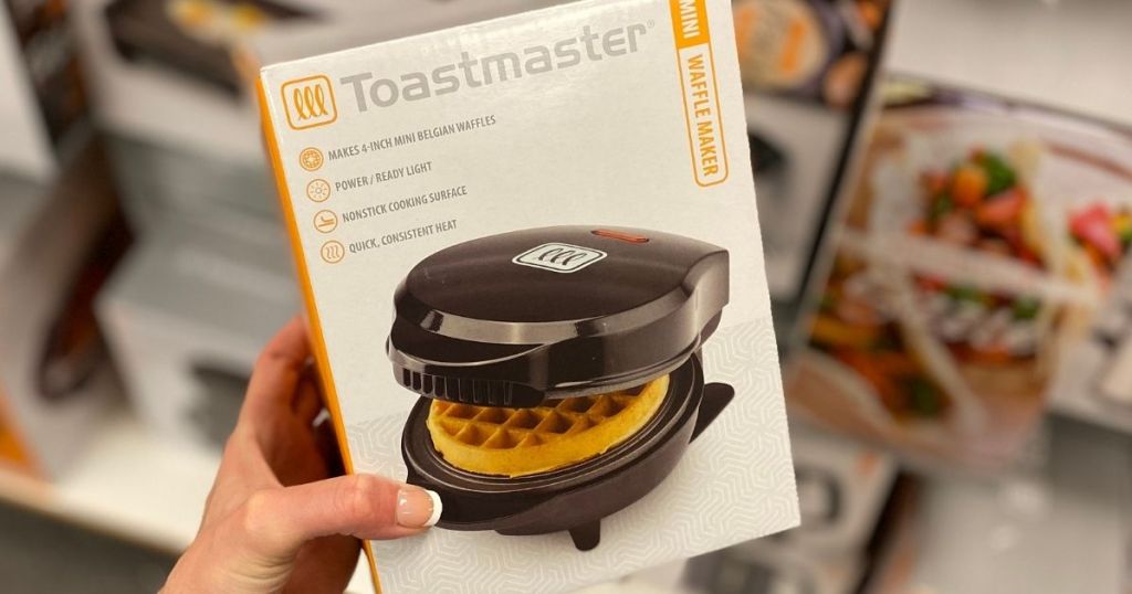 hand holding a Toastmaster Waffle Maker