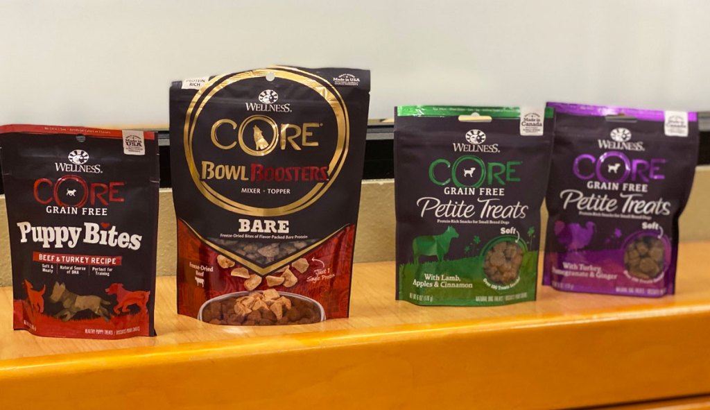bags of wellness core dog treats and food toppers