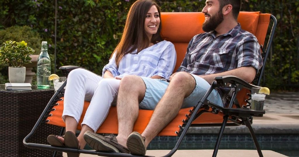 couple sitting on a bench chair