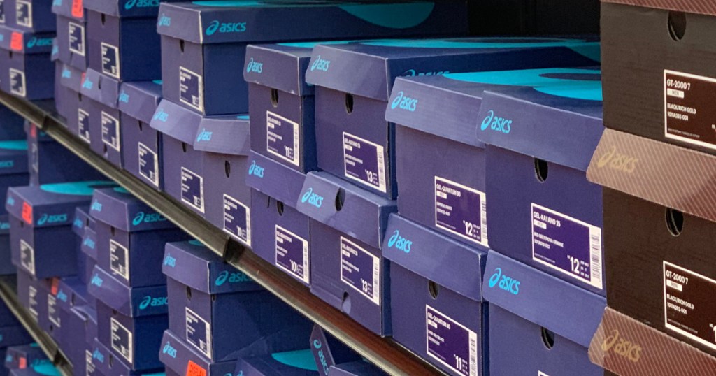 boxes of shoes stacked in store