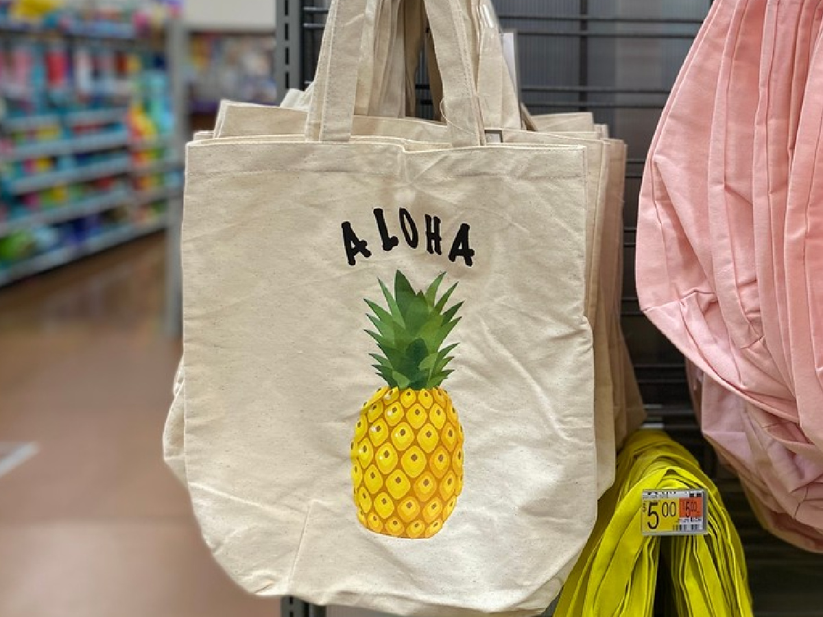 tote with picture of pineapple on it in a store