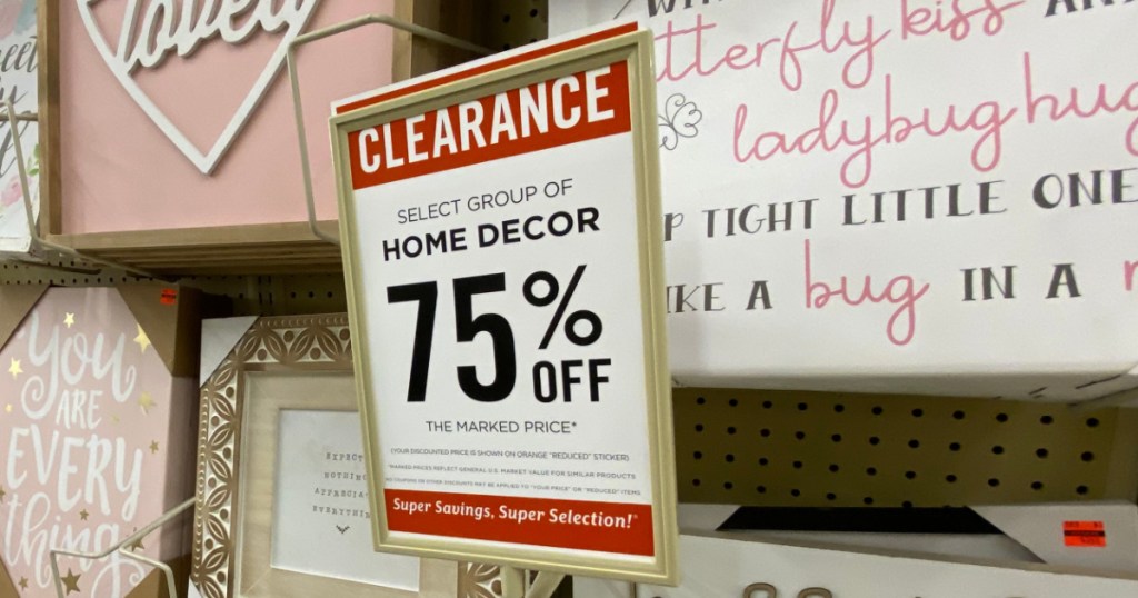sign with clearance price marked on display in store