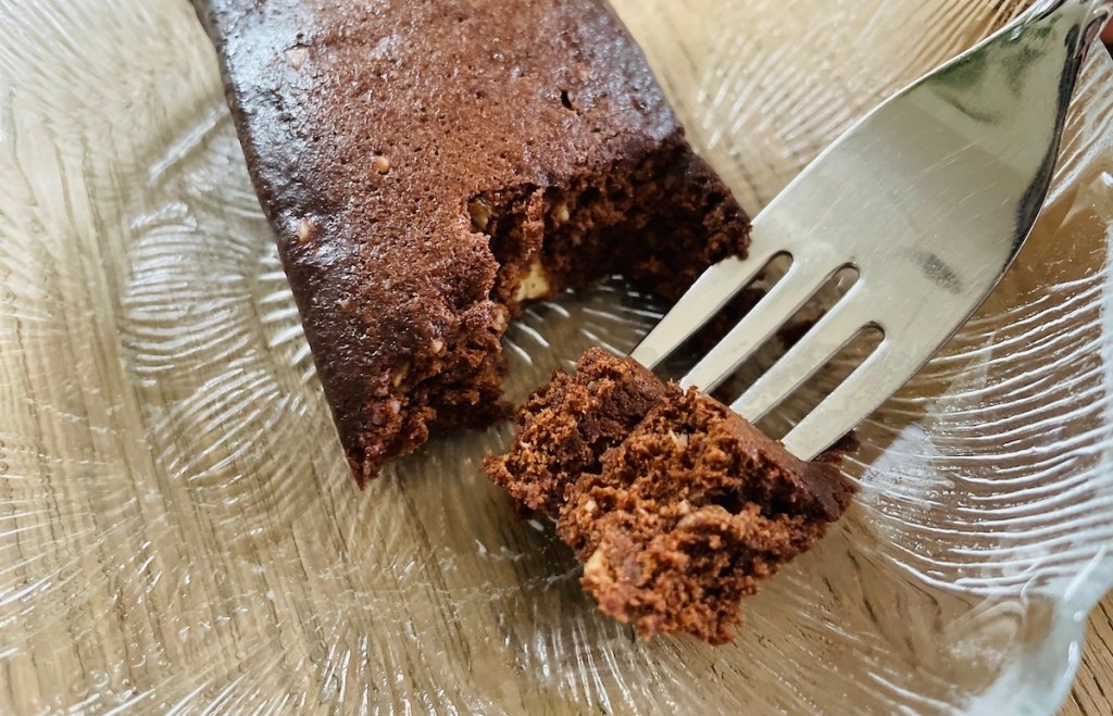 close up of fork cutting into protein bar