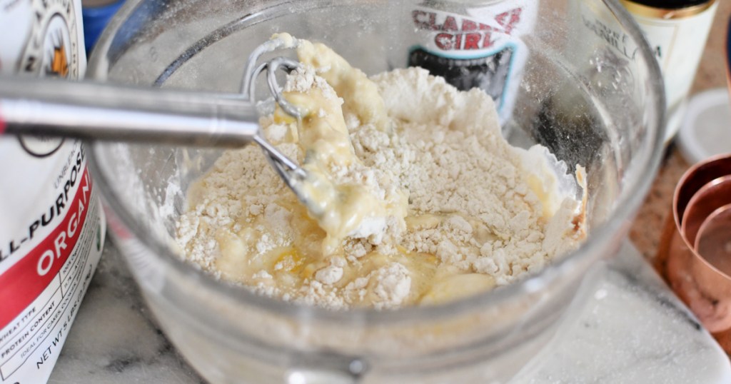 mixing pancakes in a batter bowl