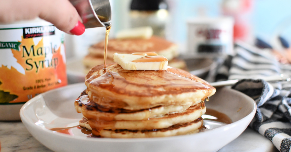 pouring maple syrup how to make pancakes from scratch