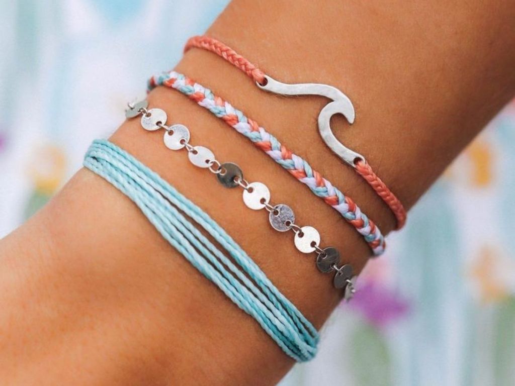 pura vida bracelets on wrist