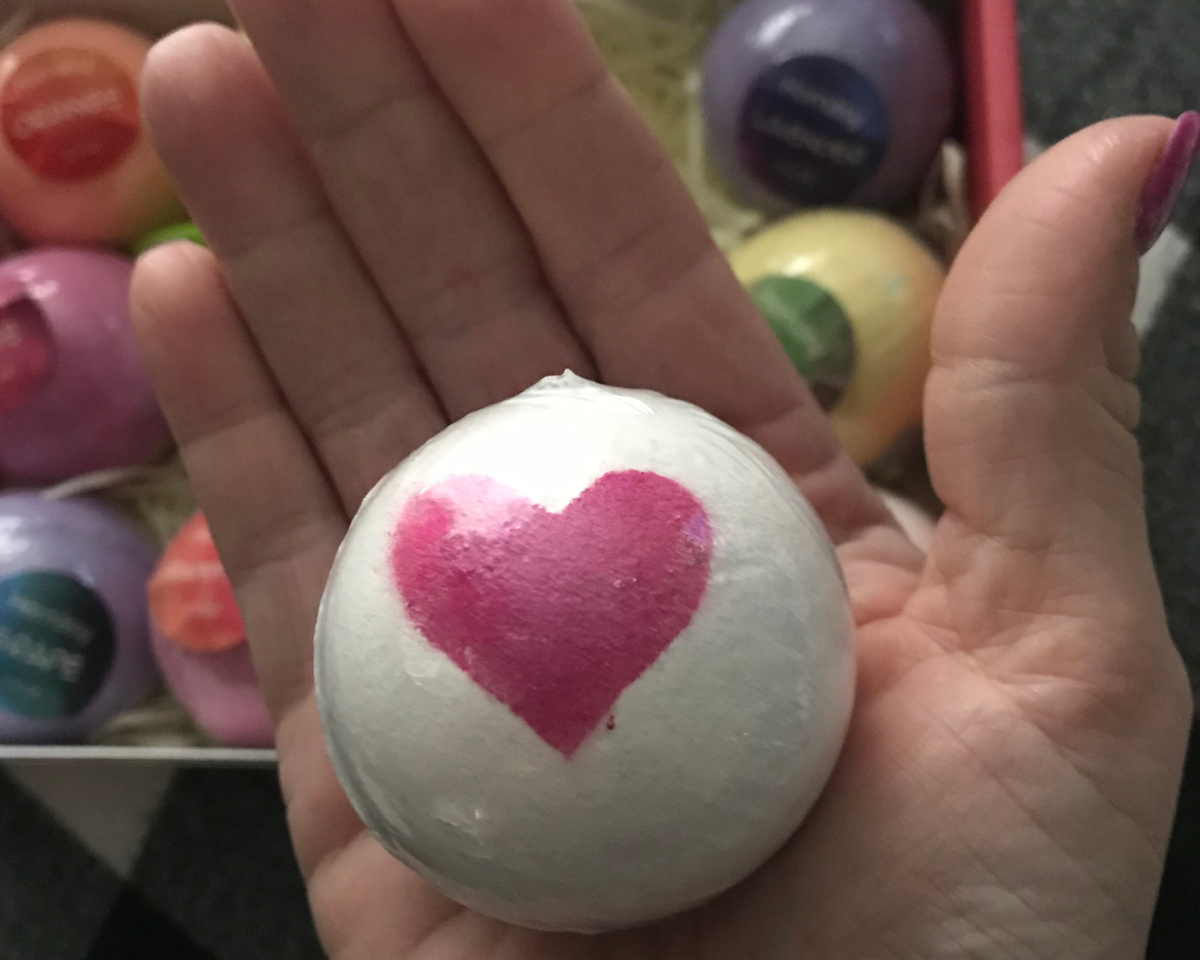 single bath bomb in hand