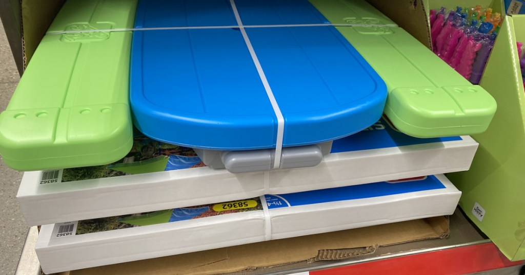 blue and green kids picnic table on display in store