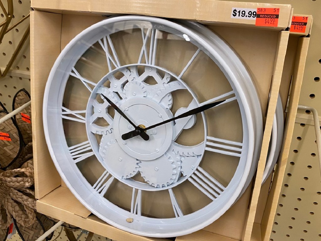 white clock in original box on display at store