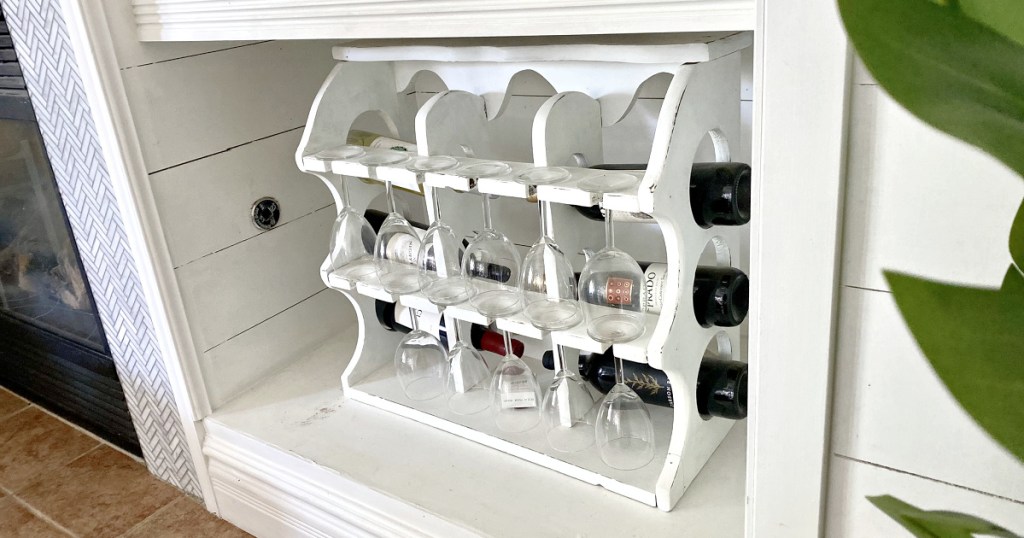white wine rack with wine bottles