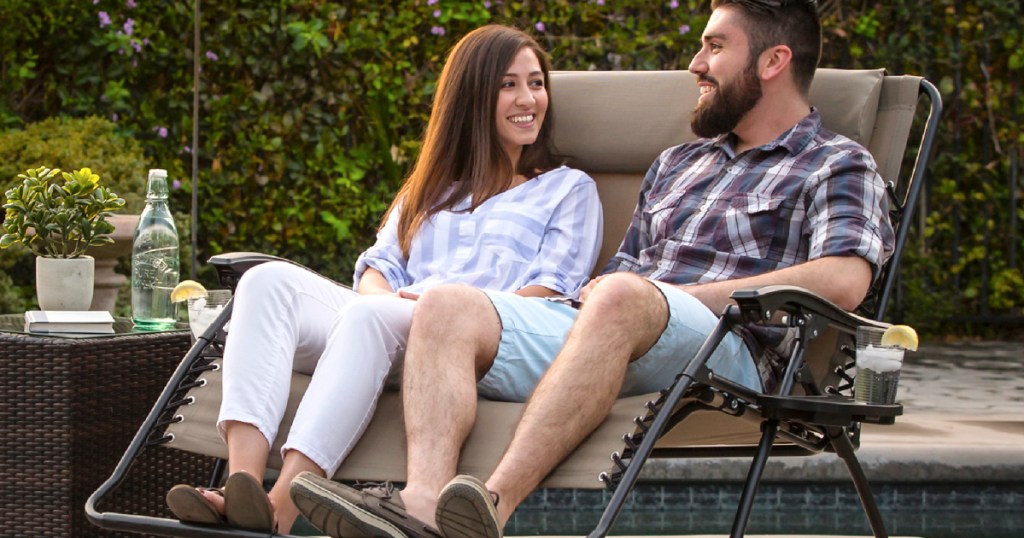 two people sitting on a bench