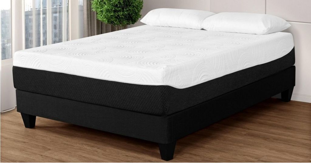 black and white mattress on black platform