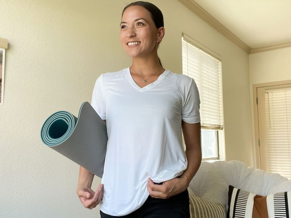 woman with yoga mat 