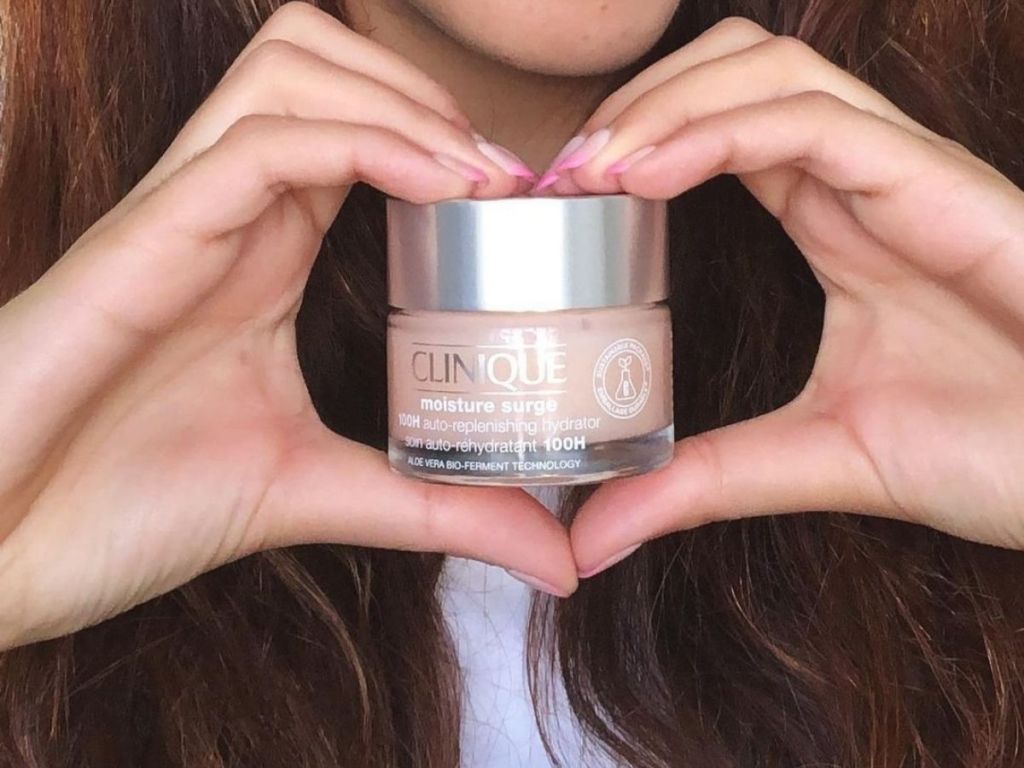 heart hands around clinique moisturizer