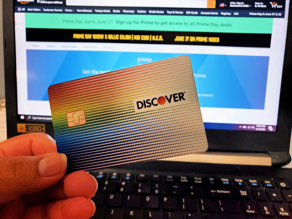Discover card in front of laptop