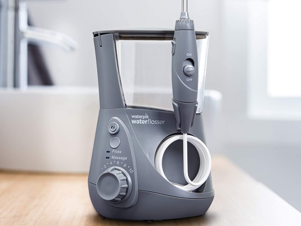 waterpik flosser in gray on countertop