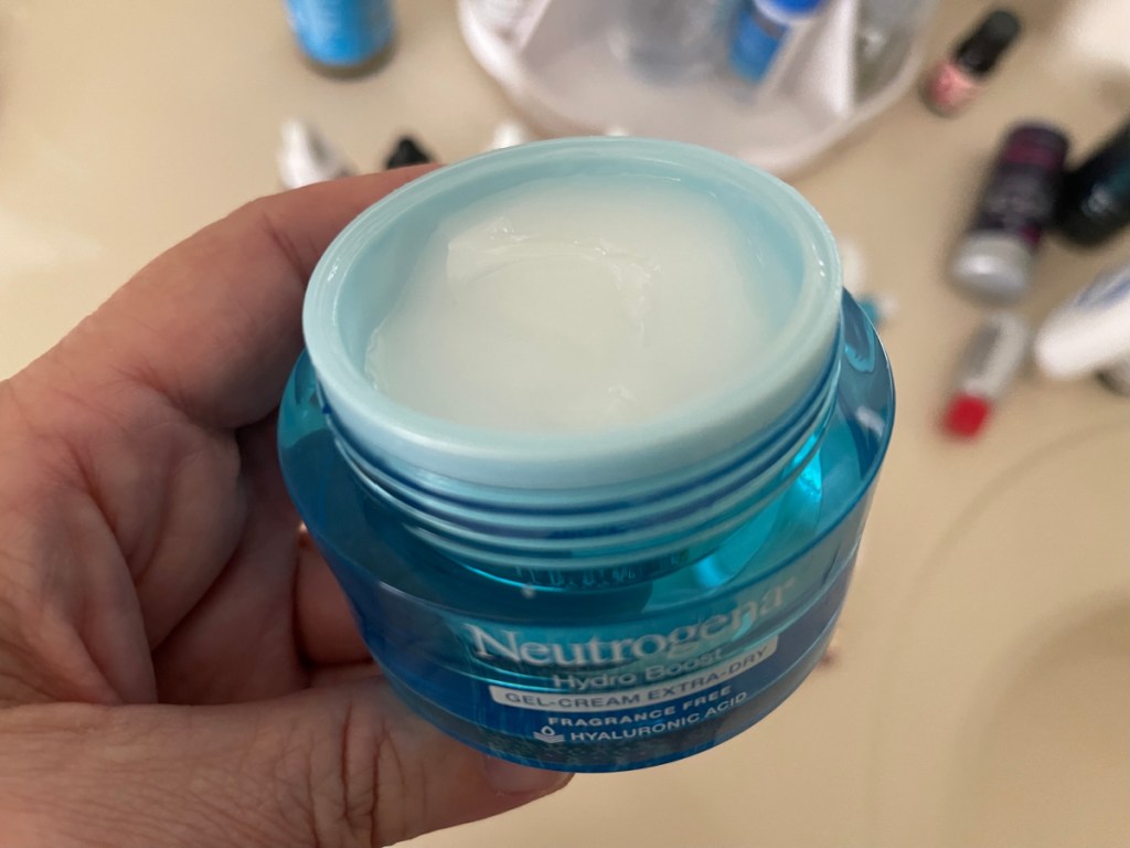 Open jar of facial cream