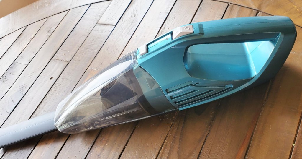 handheld vacuum on wood table