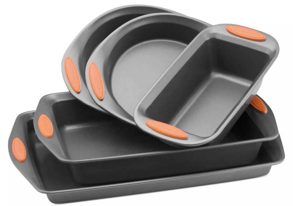 large set of bakeware pans stacked