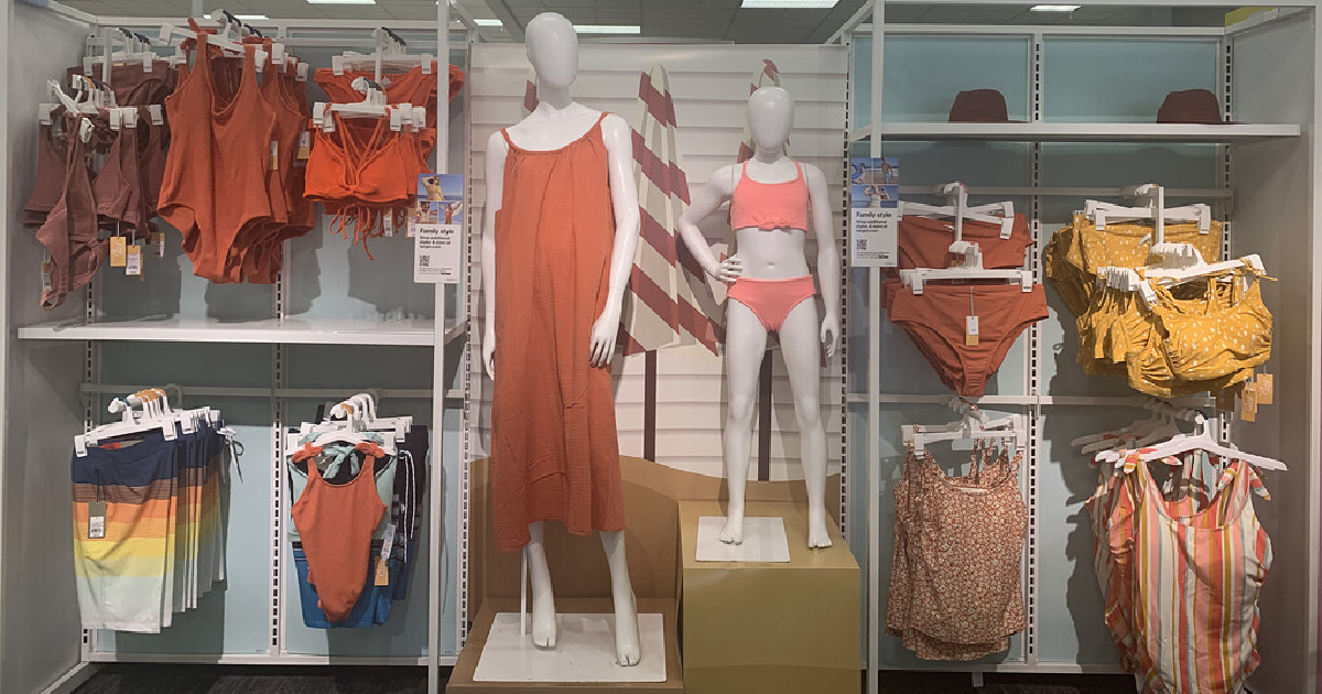 adult and kids matching swimwear on a target display wall