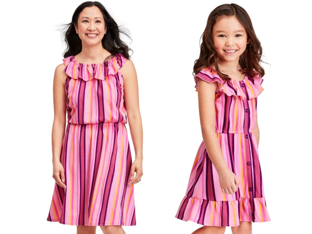 woman and child wearing matching pink dresses