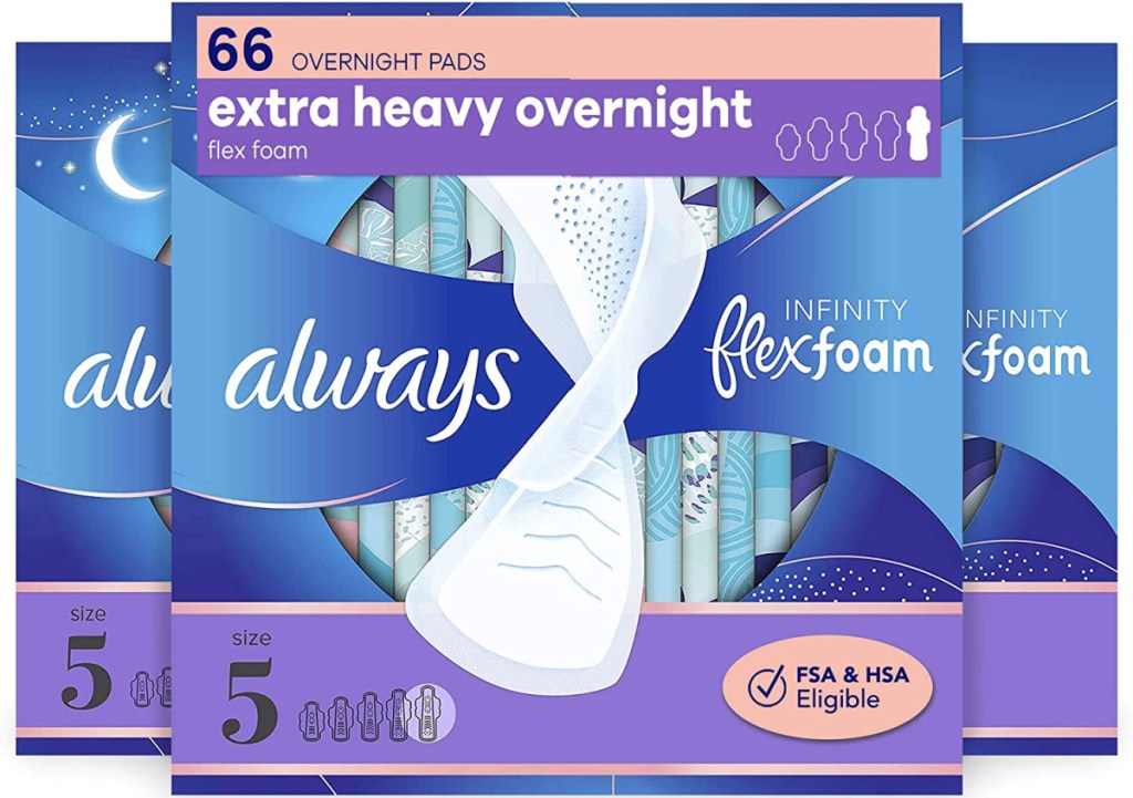 three boxes of feminine hygeine products