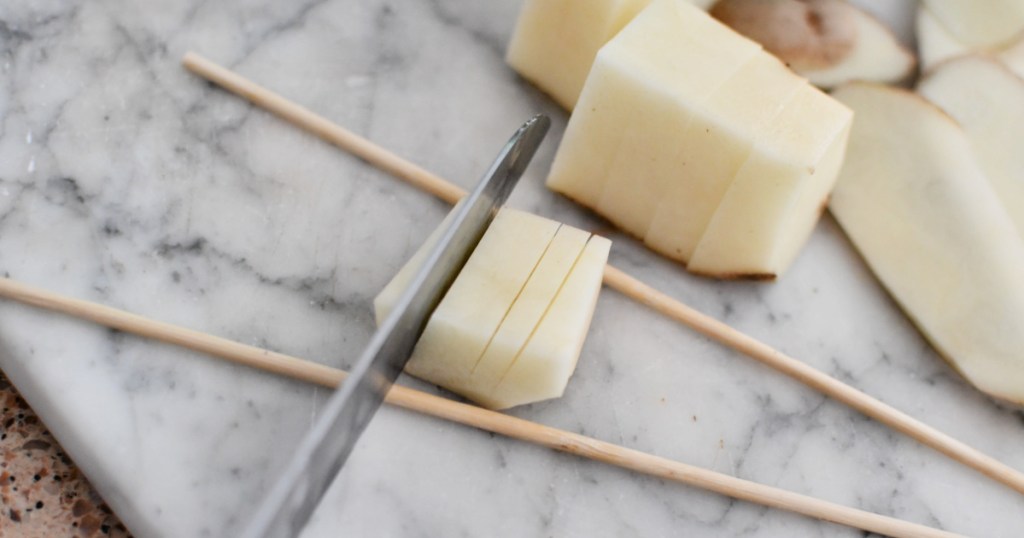 cutting hasselback potato bites