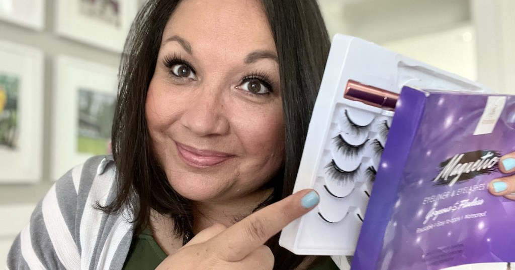 woman holding box of magnetic lashes 