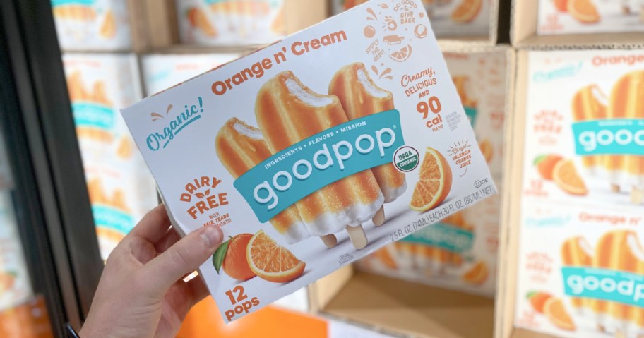 hand holding orange goodpop box
