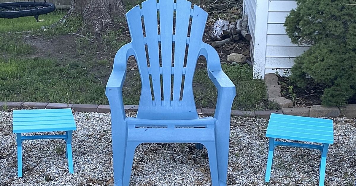 two mini plastic tables and chair in yard