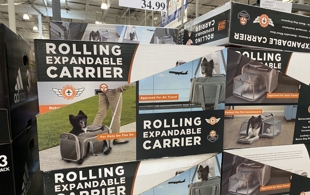 boxes of pet carriers on display at costco