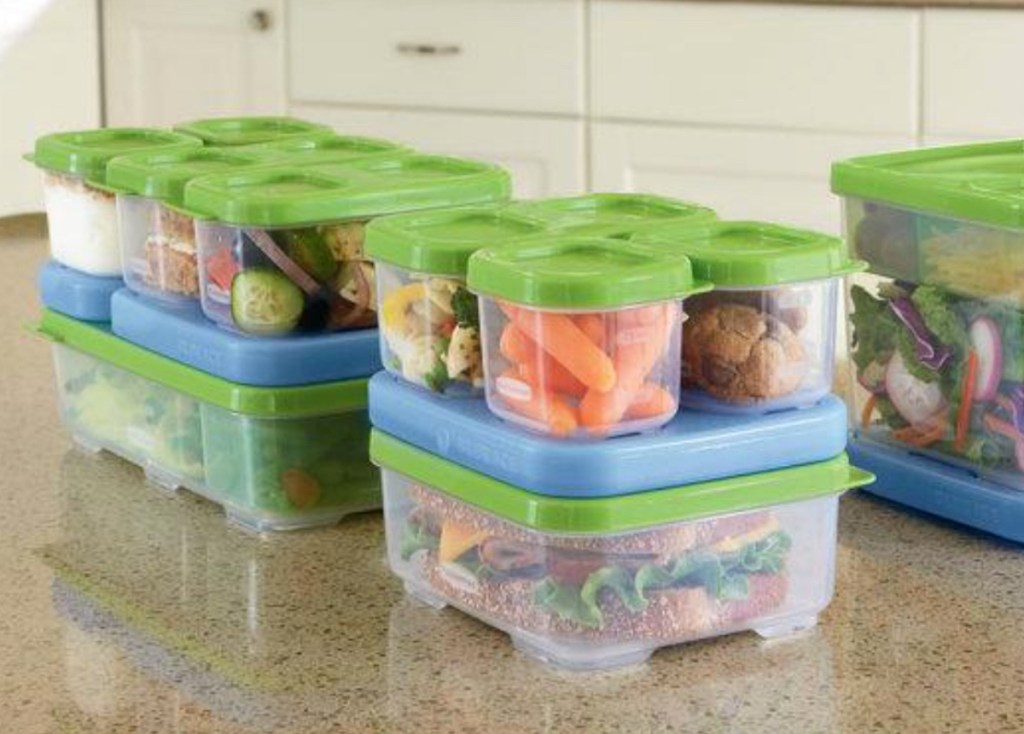 stacks of rubbermaid plastic containers with blue ice packs on counter