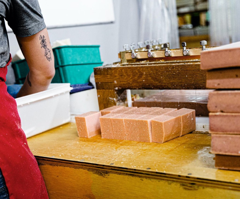 man making homemade soaps