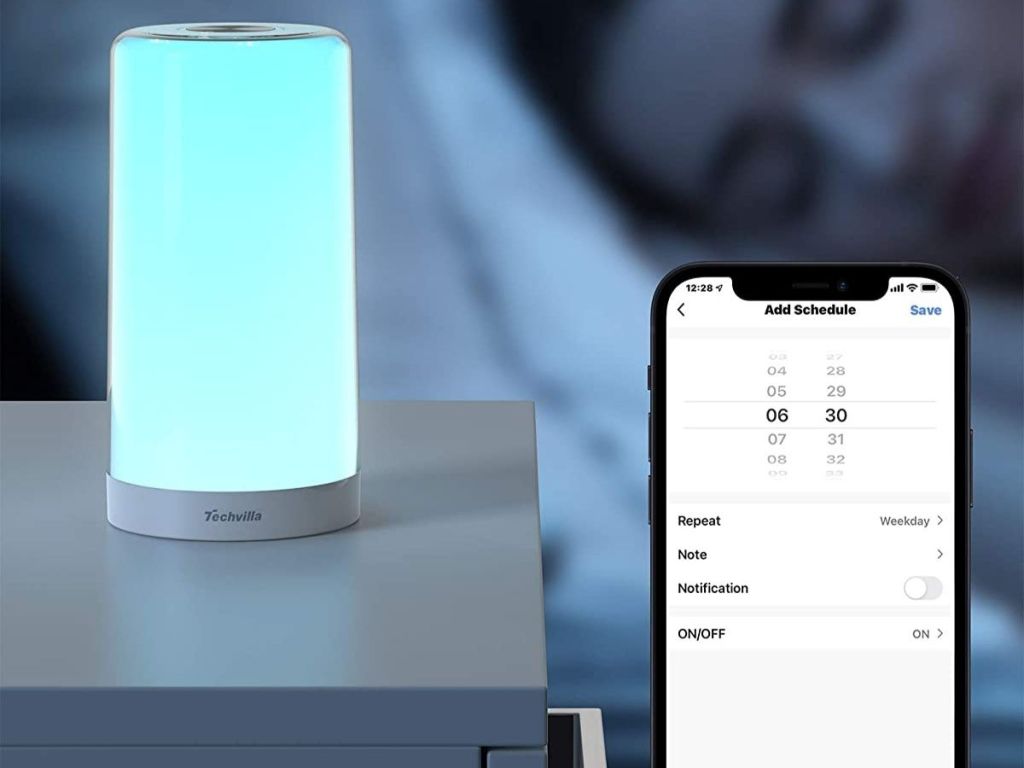 blue table lamp on bedside table