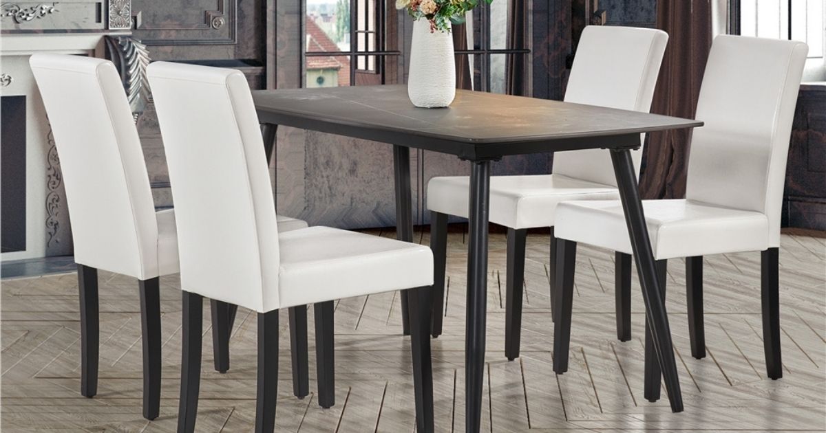 black dining room table and white chairs