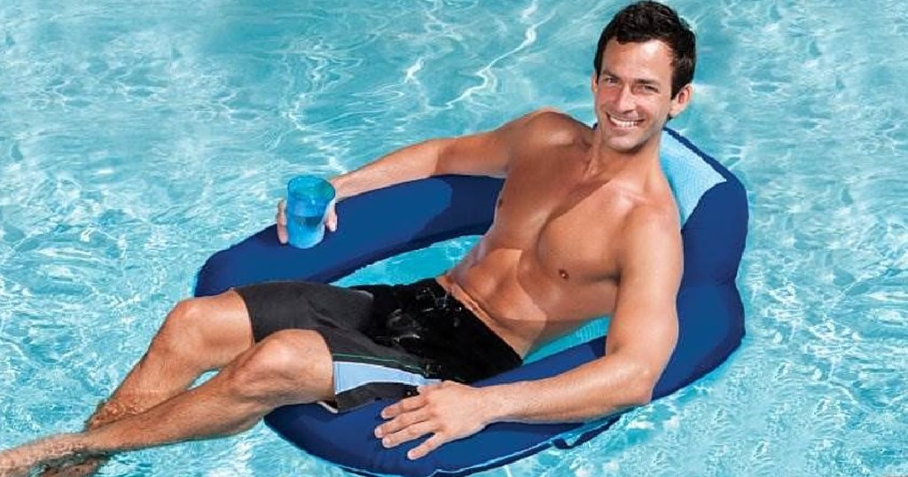 man sitting in swimways chair