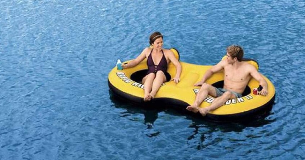 2 peope on yellow double tube