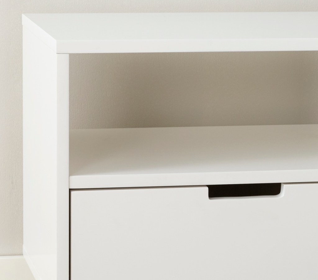 corner view of a white console table