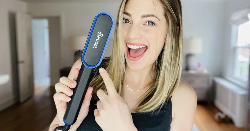 woman pointing to a straightener