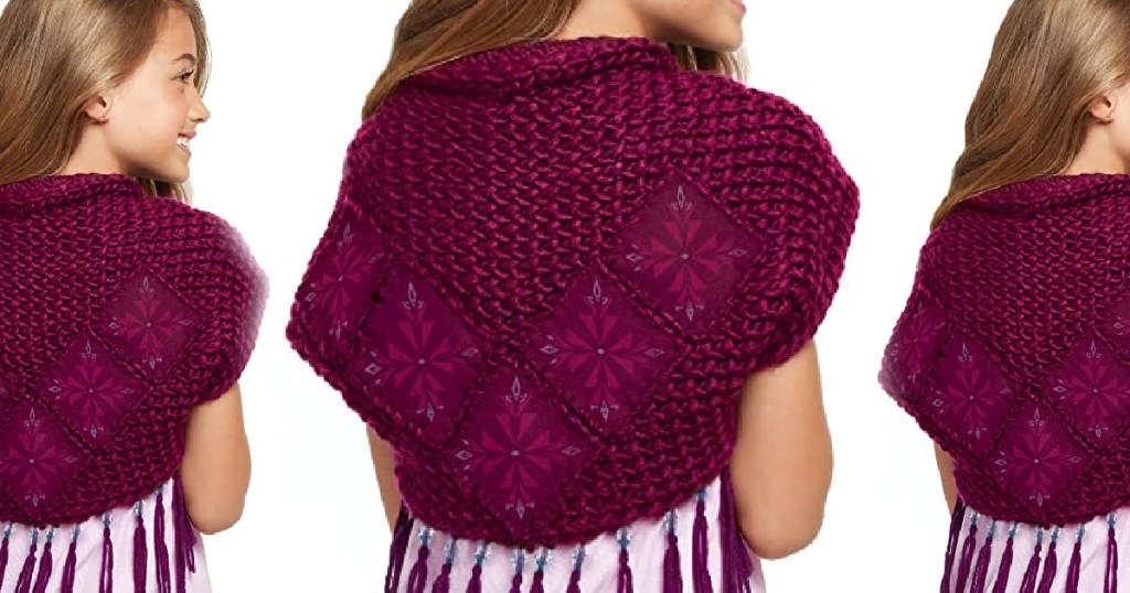 girl wearing a maroon knitted shawl