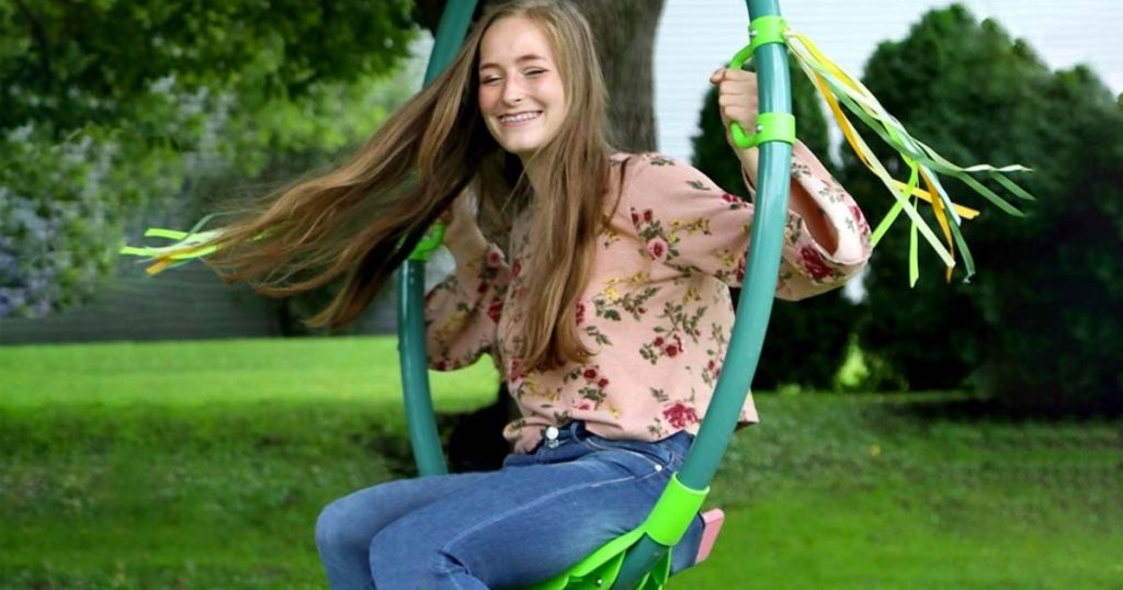 girl on green ring swing