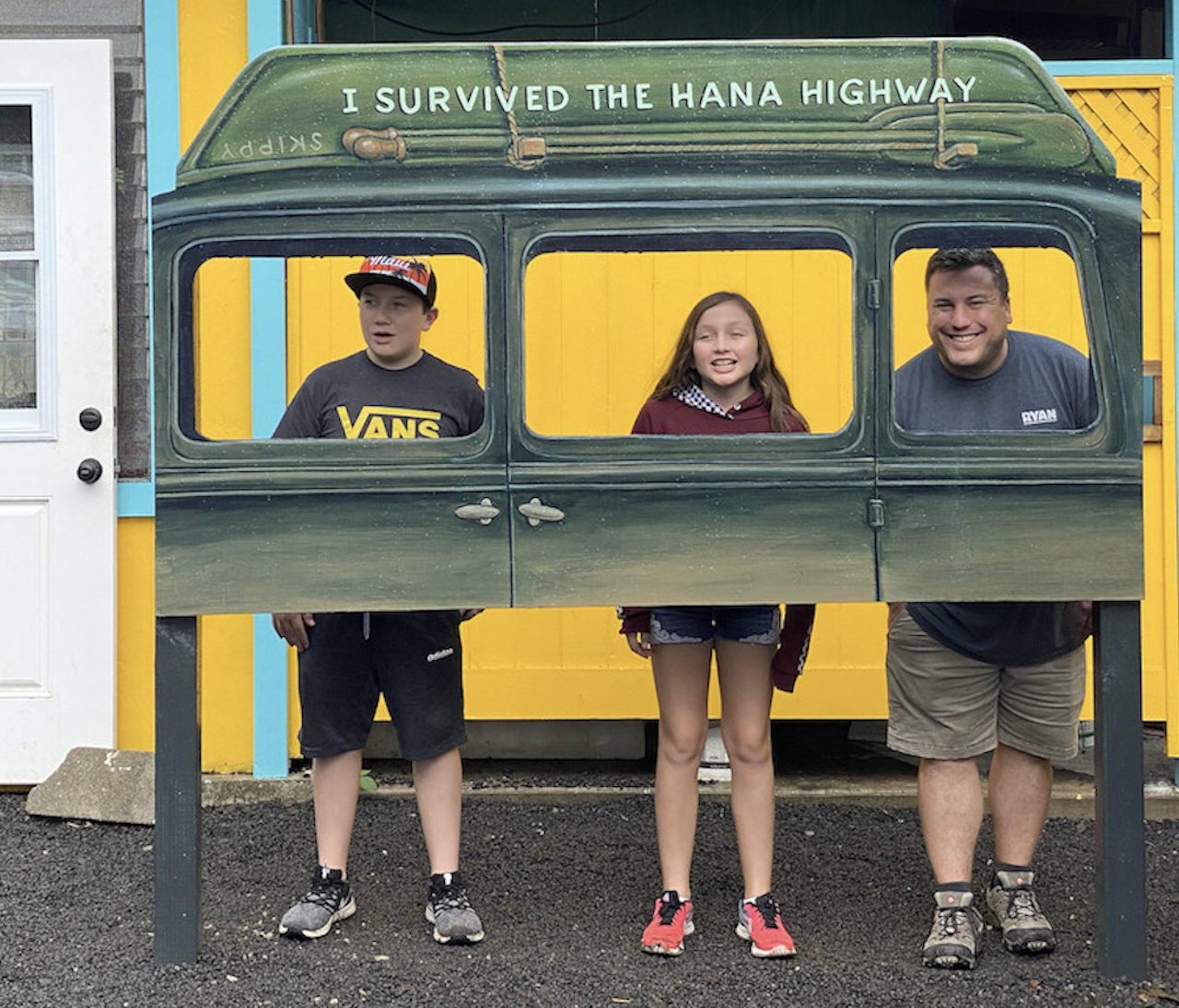 family posing in I Survived The Hana Highway car 