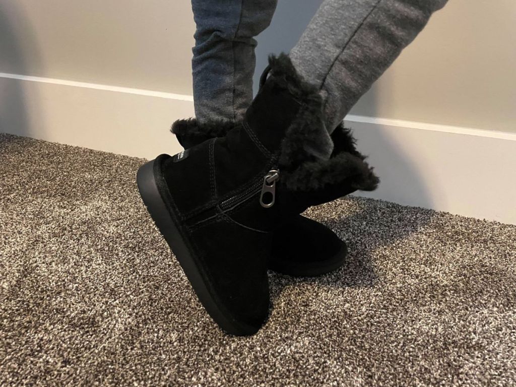 girl wearing black boots