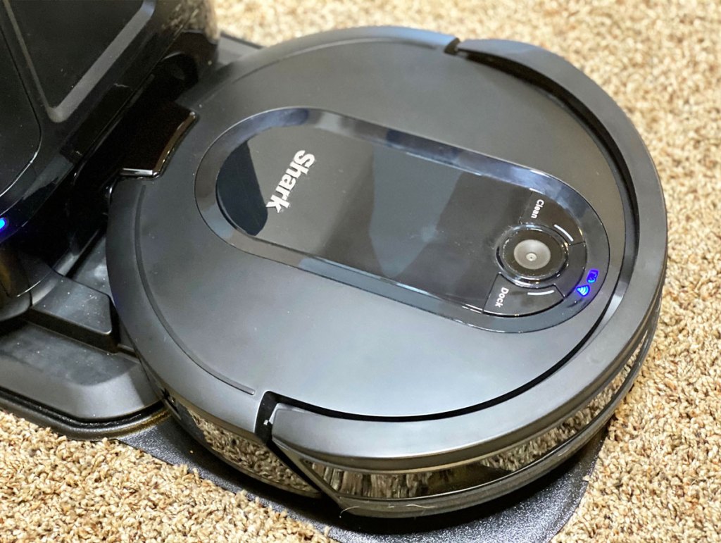 shark robotic vacuum on base