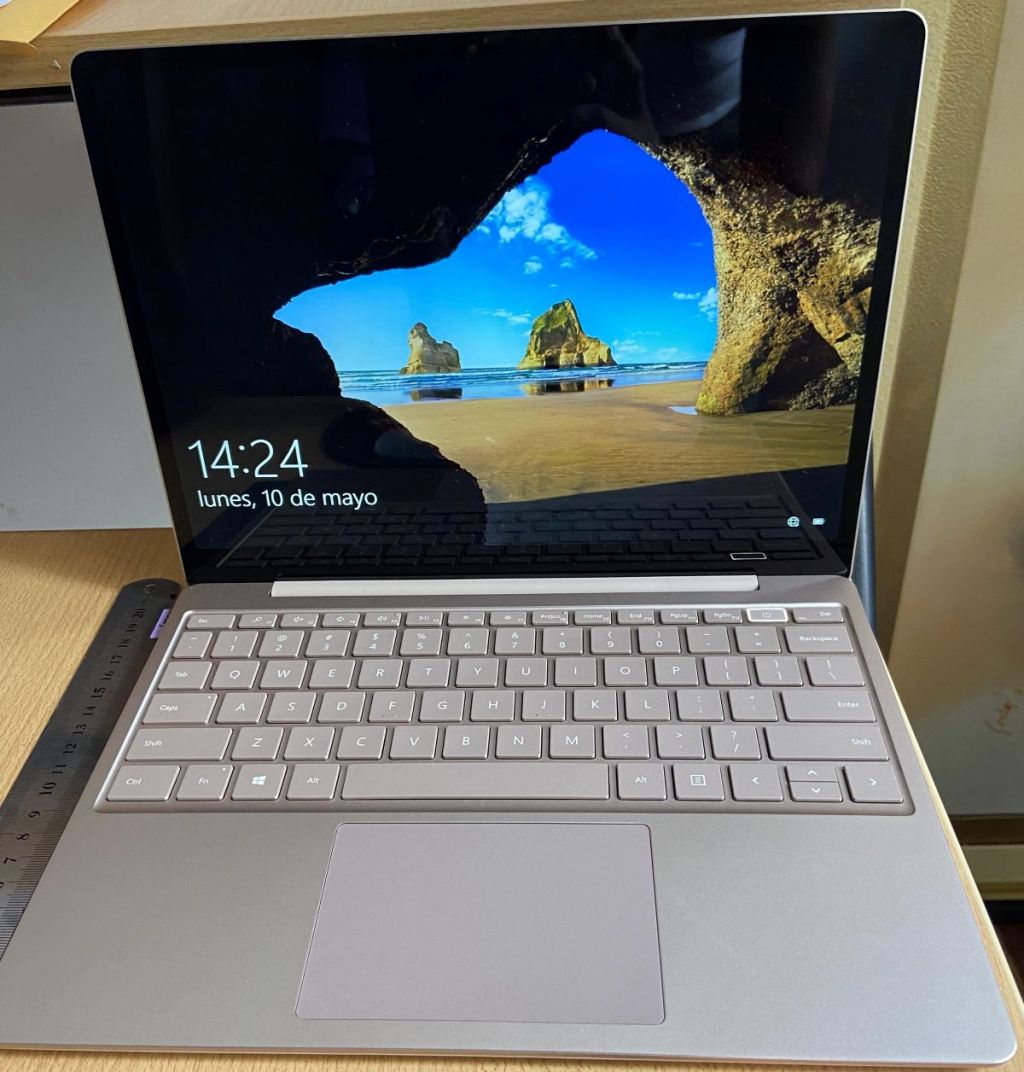 laptop with a scenic background
