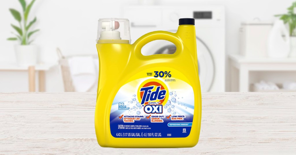 large bottle of laundry detergent on table in laundry room