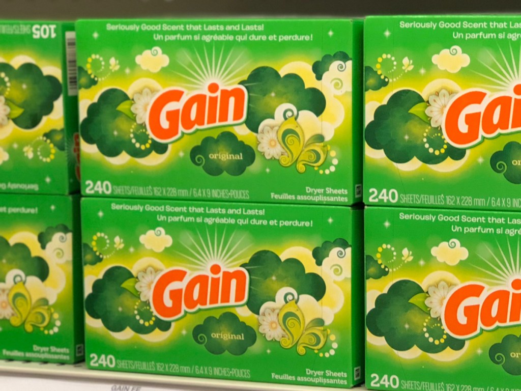 store shelves stacked with boxes of gain dryer sheets