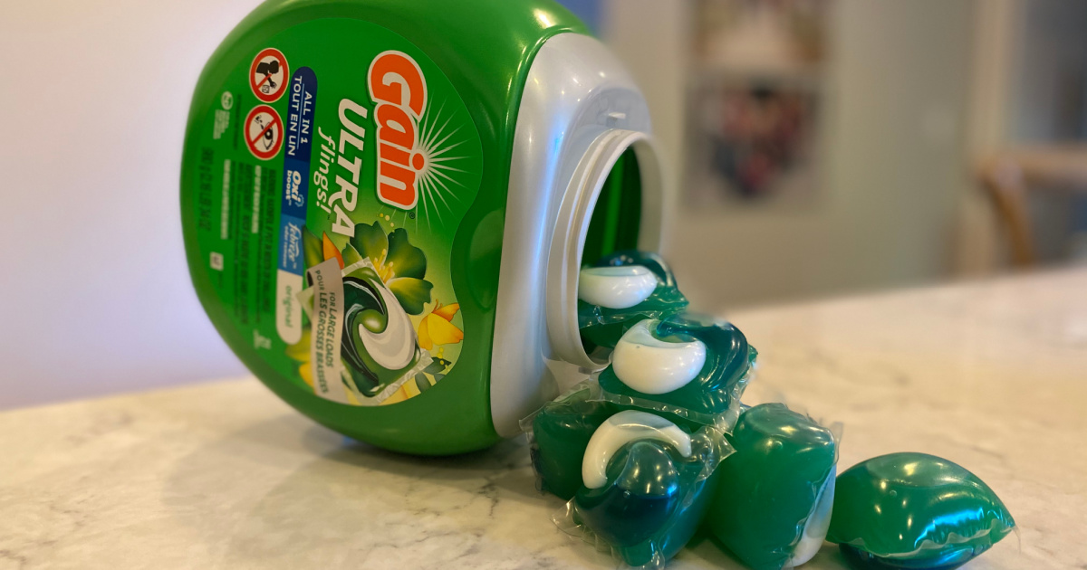 kitchen counter with container of gain flings spilling out