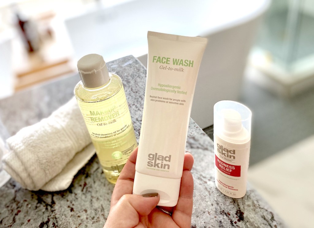 hand holding gladskin skincare for redness face wash