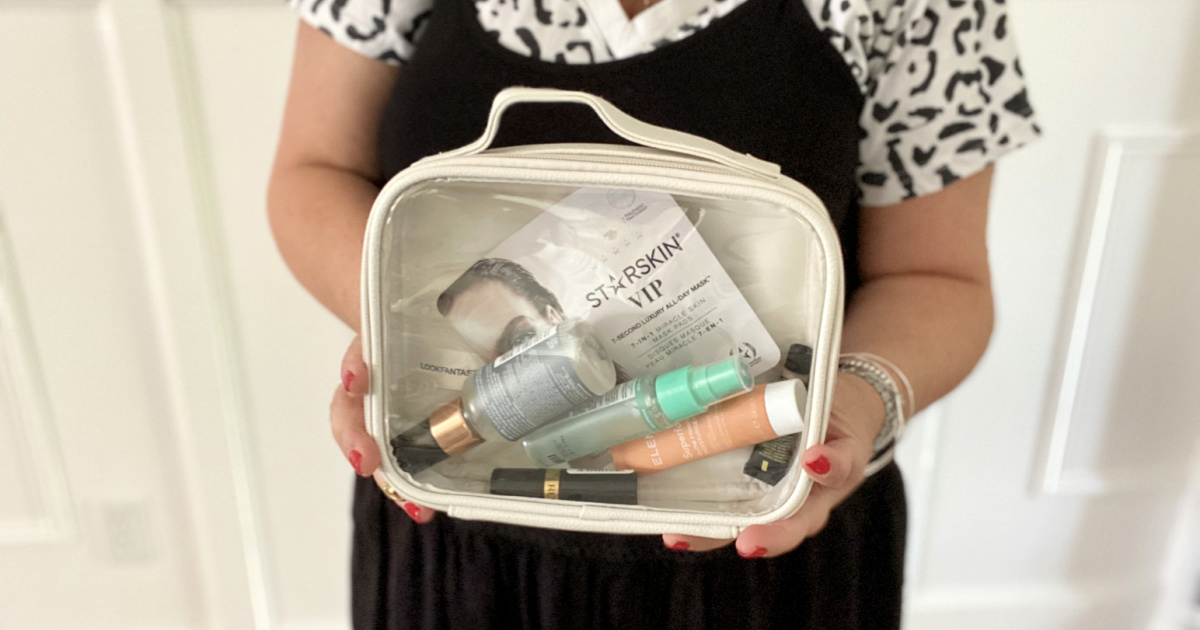 holding a lookfantastic beauty bag